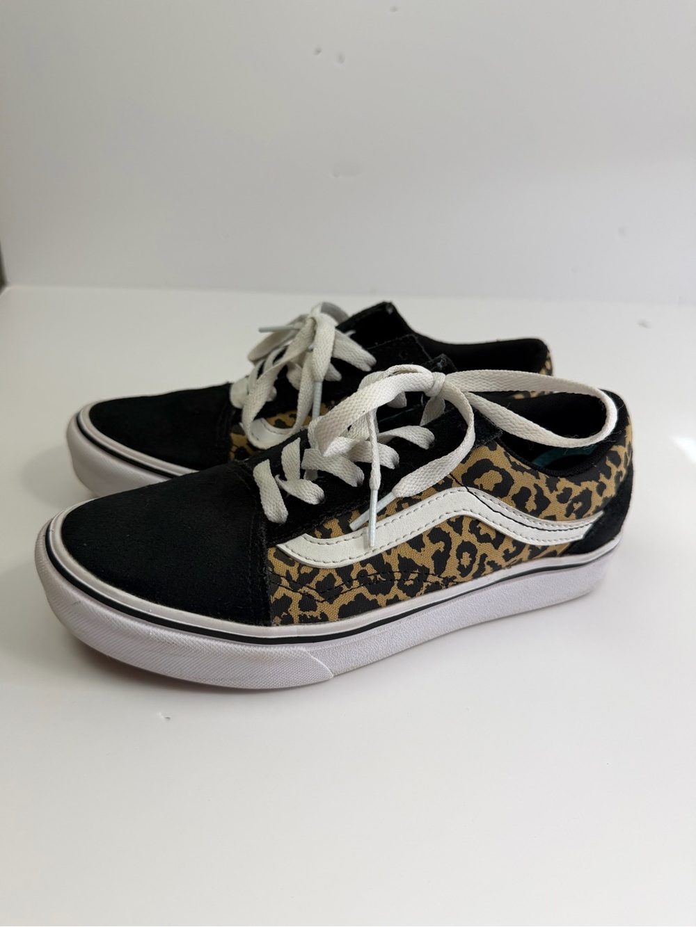 Vans Leopard Print Low-Top Sneakers in Black, White, and Brown